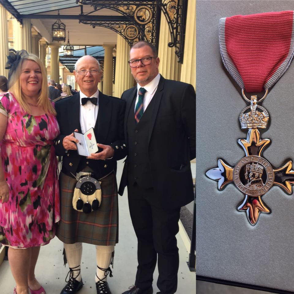 Glassmaker Tom Young awarded MBE by Prince William